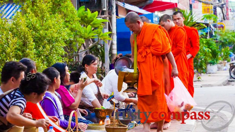 Alms giving in Vientiane