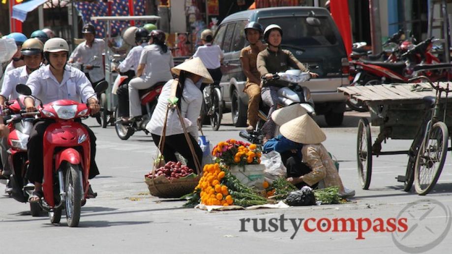 Tra Vinh, Mekong Delta. These flower sellers take their lives...