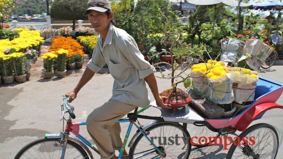 Delivering flowers by cyclo.
