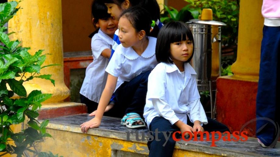 Pensive child at Le Loi School, Hue