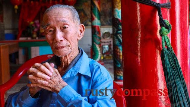 Elder in old Chinese temple, downtown Battambang