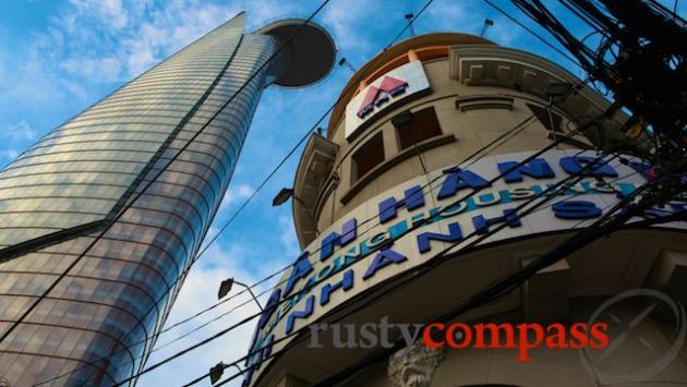 Towering above an old French era bank building.