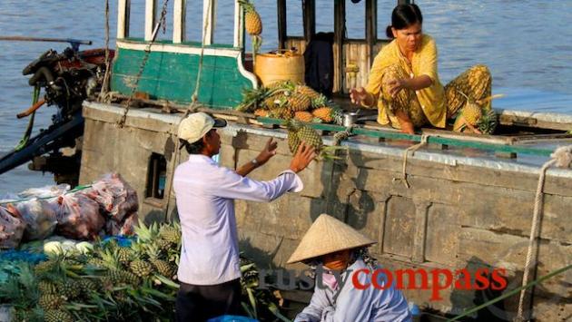 Flying pineapples, Cai Rang floating market.