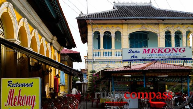 Mekong Restaurant, a traveller favourite in Chau Doc and the family home and Le Cong Bich's ancestral worship house on the left.