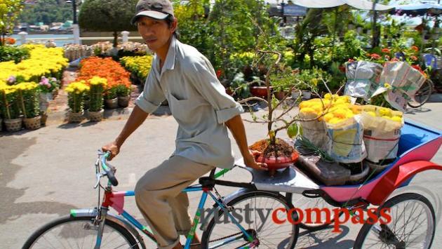 Delivering flowers by cyclo.
