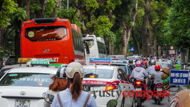 The traffic returns to Hanoi's weekend walking precinct.