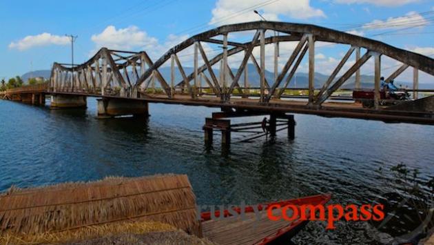 War ravaged French era bridge on the Kampot riverfront