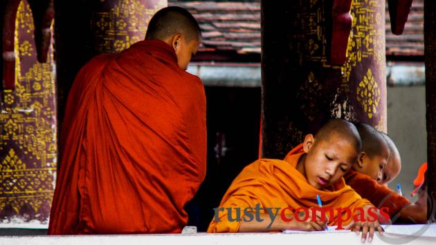 Novice monks studying, Luang Prabang