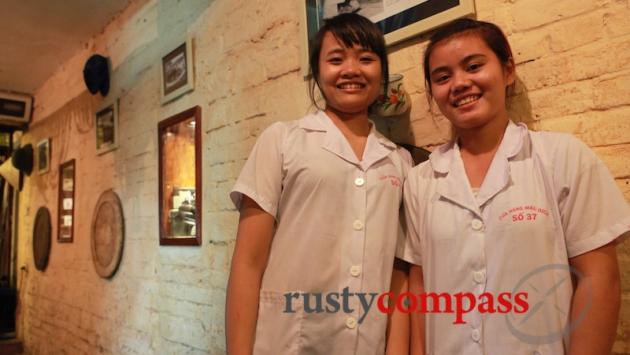 Waitresses wear the uniforms of the old State food stores.
