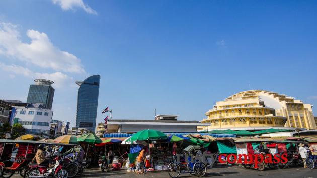 Phnom Penh's central market and an emerging modern skyline.