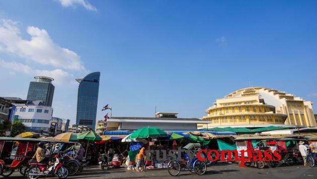 Phnom Penh's central market and an emerging modern skyline.