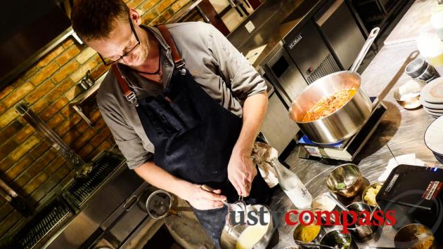 Julien's in charge of the open kitchen - Quince Saigon