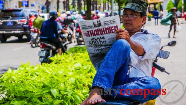 Delicate balance - Saigon xe om moto-taxi driver.