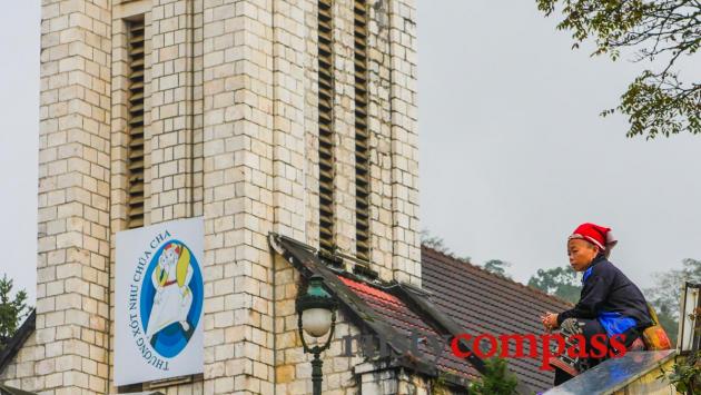 Sapa church and a Red Dzao woman