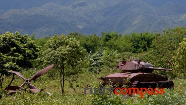 French military junk rusting in a Dien Bien Phu field