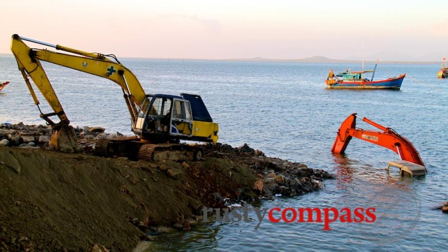 One of the excavators got a little carried away. Vung...