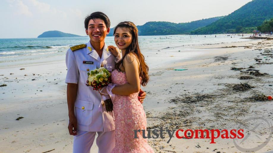 A happy couple get their wedding shots on Bai Sao...