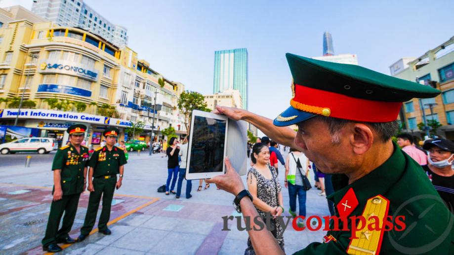 On 30 April, military brass use an iPad to catch...