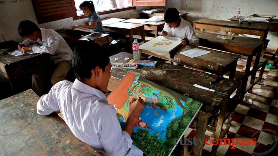 Students at work at the former École des Arts Cambodgiens...