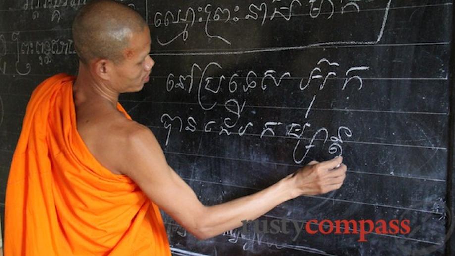 Tra Vinh, Ang Khmer Pagoda. This monk writes my name...