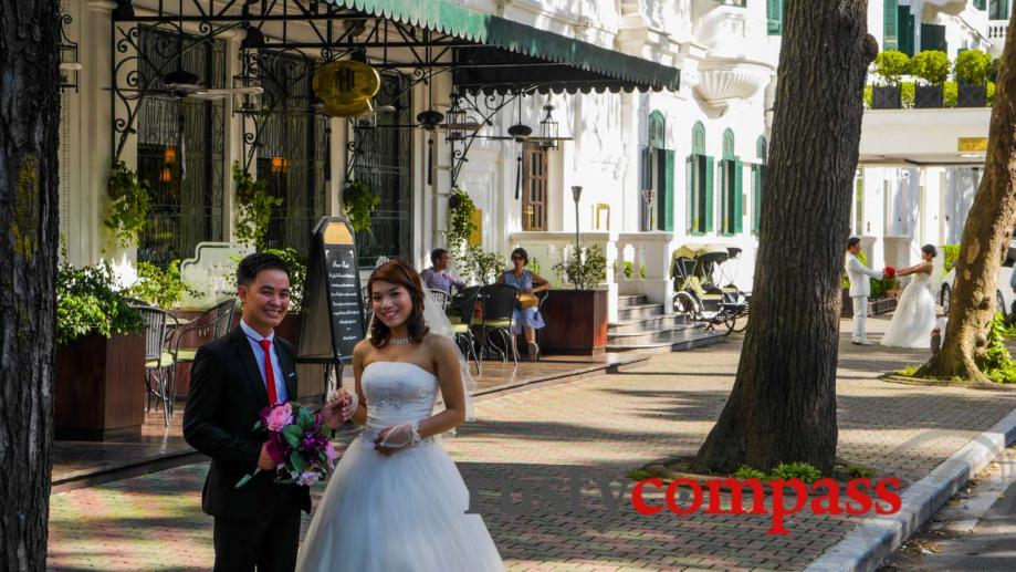Wedding season outside Hanoi's Metropole Hotel.