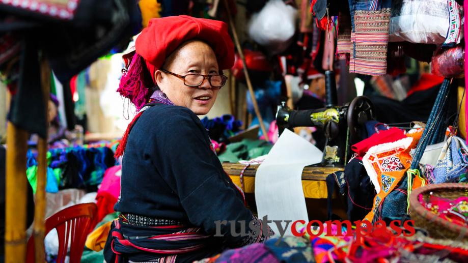 A Red Dzao woman  with beautiful handmade fabrics in...