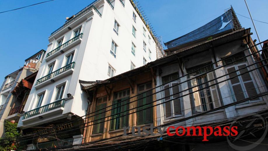 The original buildings of Hanoi's Old Quarter are increasingly being...