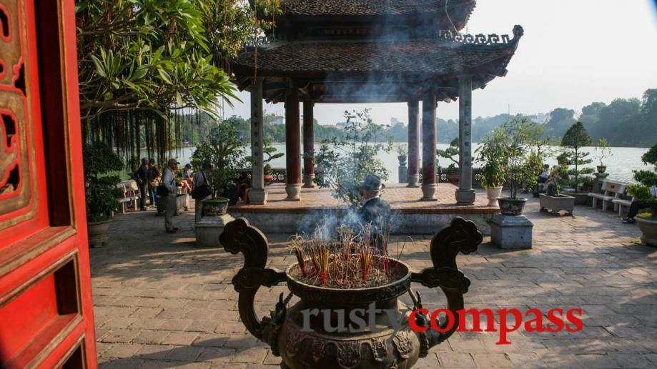 Ngoc Son Temple looks over Hoan Kiem Lake in central...