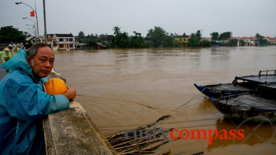 Watching the flood waters rise. Hoi An.