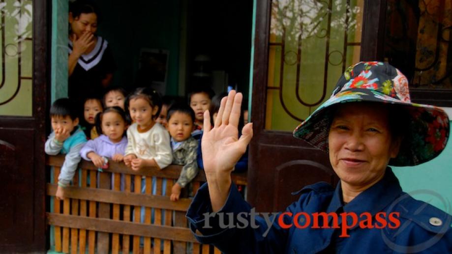 Teacher and students off Bach Dang St, Hue