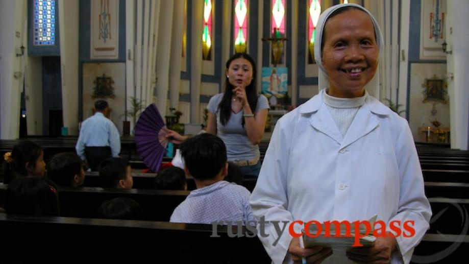 A nun at Hue's main cathedral. 