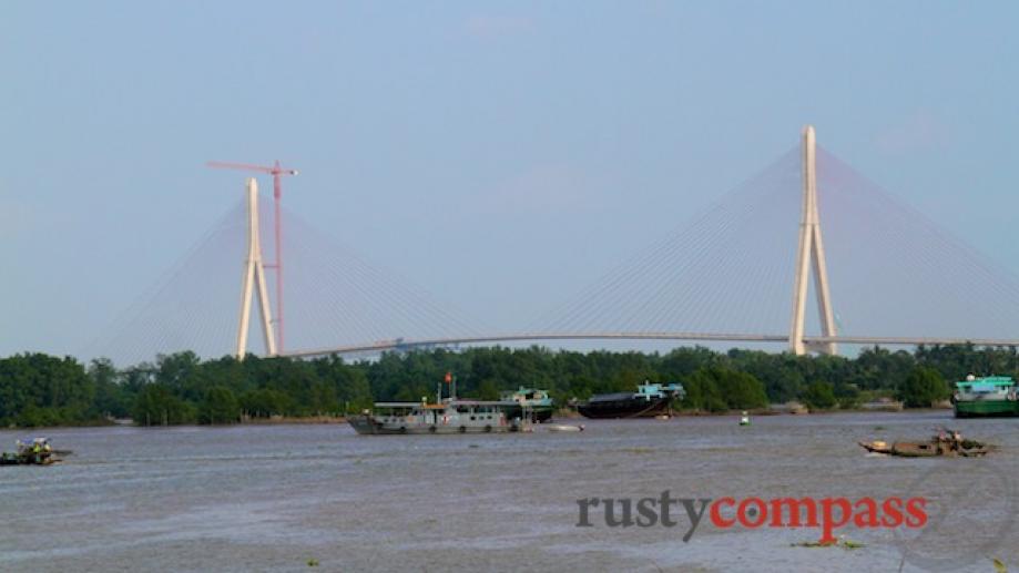 The soon to open Mekong River bridge to Can Tho.