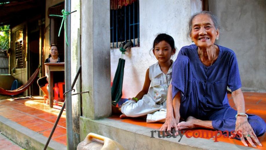 Three generations of delta dwellers - grandmother and granchild with...