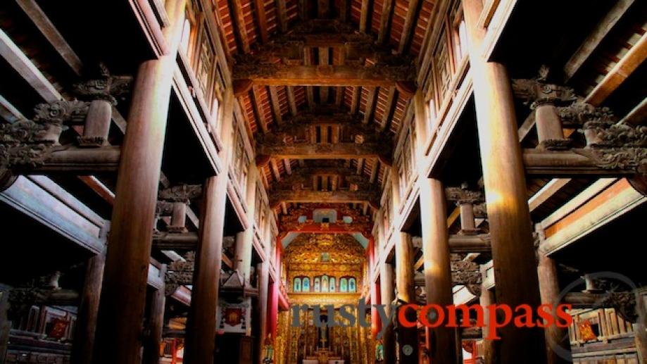 The timber interior is like a huge Buddhist pagoda colliding...