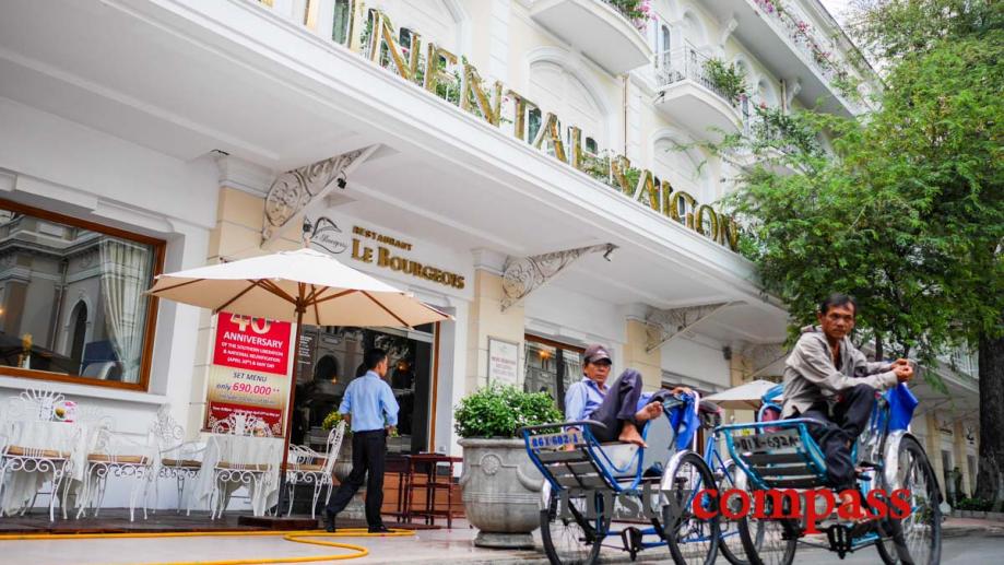 Cyclo drivers have been a fixture oustide the Continental Hotel...