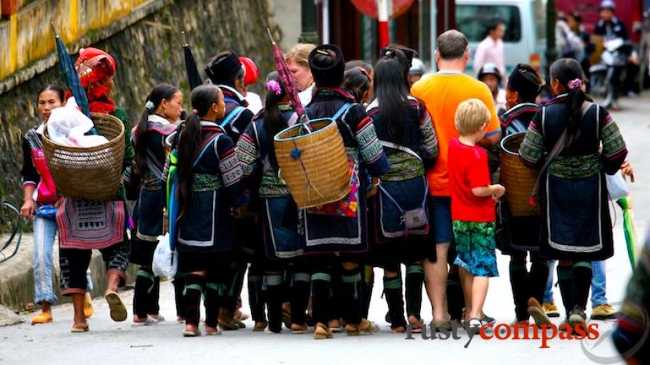 Day 3. A swarm of Black Hmong sellers, many of...