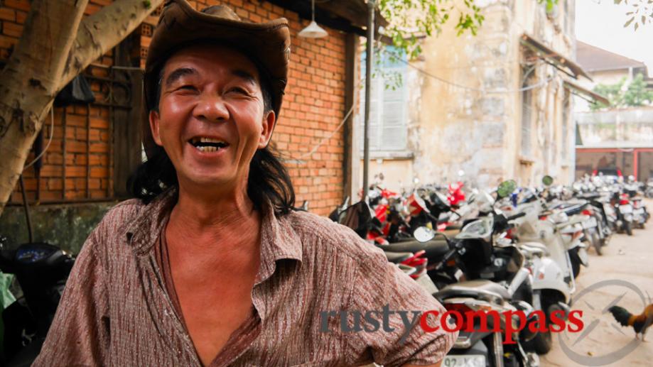 Motorcycle attendant, Saigon
