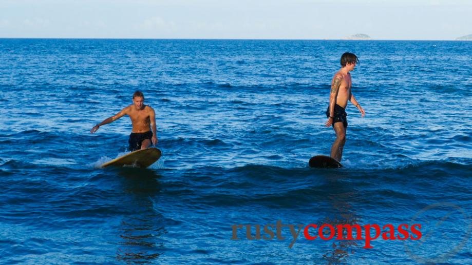 The optimists - waiting for a wave at Hoi An's An Bang beach